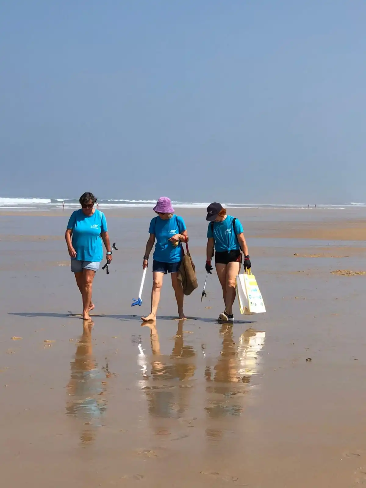 Beach cleanup by three SeaCleaners volunteers